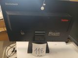 a computer monitor sitting on a desk with a price tag