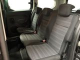 the interior of a car with two seats and a steering wheel