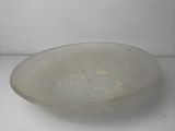 an image of a glass bowl on a white surface