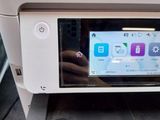 a photo of a printer that is sitting on a table