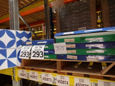 many boxes on the shelves in the store for sale
