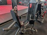 a gym with a lot of equipment in the room