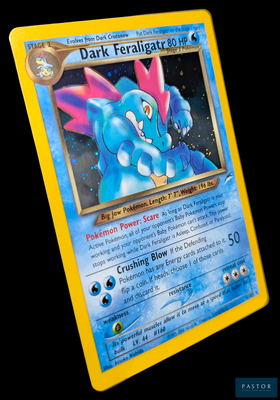 gros plan d'une carte pokemon sur fond noir