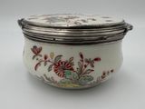 an image of a white and red bowl with flowers on it