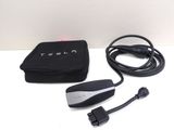 a black box with a charger and a cord attached to it