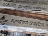 several stacks of cardboards stacked on top of each other in a warehouse