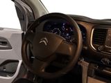 the interior of a car with a steering wheel, dashboard, and dash board