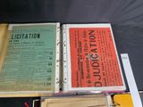 a book with a lot of papers on it sitting on a table
