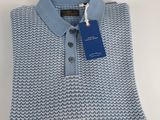 a polo shirt with a blue and white pattern on the collar