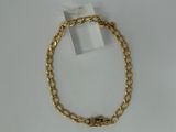 a gold chain bracelet with a heart charm on it