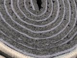 a roll of fabric sitting on top of a table