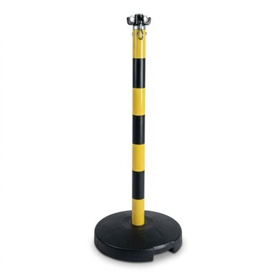 un poteau jaune et noir avec une base noire