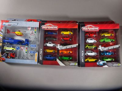 a lot of toy cars that are in the box