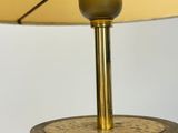 a close up of a lamp on a table with a white background