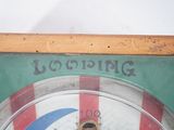 a close up of a clock with a red, white and blue stripe