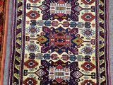 two rugs with different colors and patterns on them