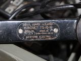 a close up of an old sewing machine with a label on it