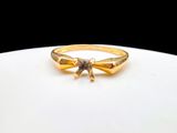 an image of a gold ring with a star on top of it