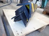several pieces of wood are stacked on top of each other on a pallet