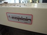 a close up of a machine that has a sign on it