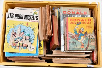 de nombreux livres dans une boîte jaune posée sur la table