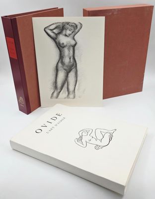 the book is open to show a drawing of a nude