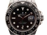 montre Rolex avec cadran noir et lunette noire