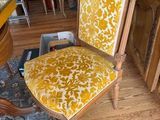 a chair that is sitting in the middle of a room
