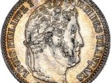 pièce de monnaie en argent portant l'image d'une tête d'homme