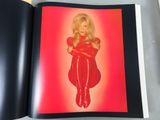 an image of a book with a picture of a woman in a red dress
