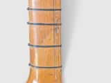 a close up of a wooden object on a wall