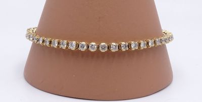 Bracelet tennis en or jaune 14 carats serti de diamants