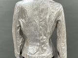the back view of a silver jacket on a mannequin mannequin mannequin mannequin mannequin mannequin mannequin manne