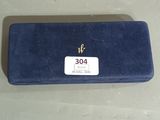 a blue case that has a name tag on it