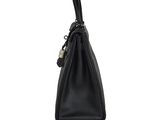 the black leather handbag is open and ready to be used