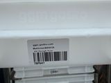 a stack of plastic containers that have a barcode on them