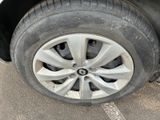 a close up of a tire on a car ' s rim