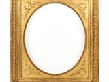 an old gold frame with a white background