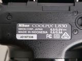 a close up of the back of a camera with the nikon coolpix l8