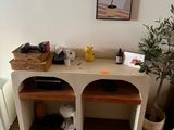 a picture of a living room with a couch and a table