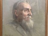 portrait of a man with a beard in a gold frame