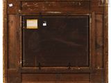 an image of a picture of a wooden frame with a label on it