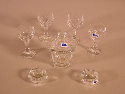 a lot of glass items that are on a table