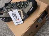 a box with a pair of hiking shoes on top of it