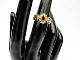 an image of a hand with a ring on it ' s finger