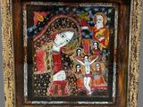 an old painting of a woman with a child in her lap