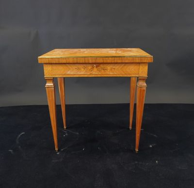 a small wooden table with a drawer on one side and a drawer on the other