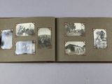 an open book with pictures of people and animals on it