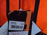 a close up of an orange backpack with a tag on it