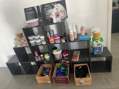 a shelf that has many different types of items in it